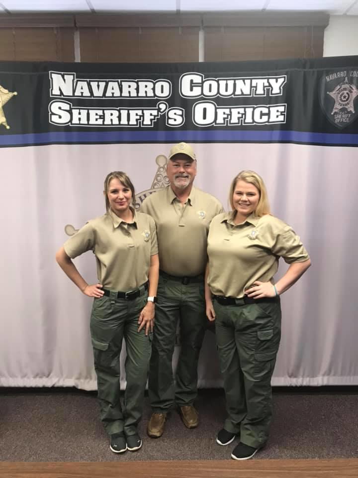 the sheriff with two new female communications officers