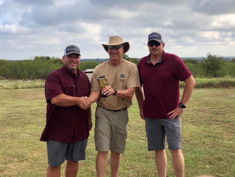 Sheriff Tanner congratulates NCSO team of Captain Stan Farmer and Sergeant Jeff Harbuck as this years champions of the Habitat for Humanity Skeet Shoot