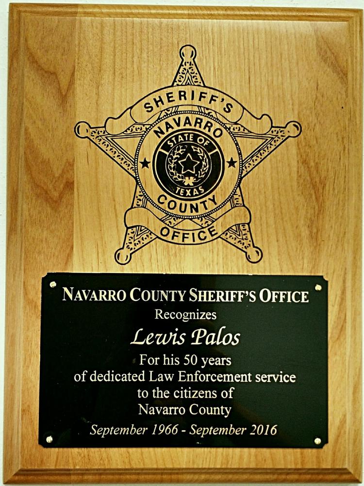 Plaque: Navarro County Sheriff's Office Recognizes Lewis Palos for his 50 years of dedicated law enforcement service to the citizens of Navarro County. September 1966 - September 2016